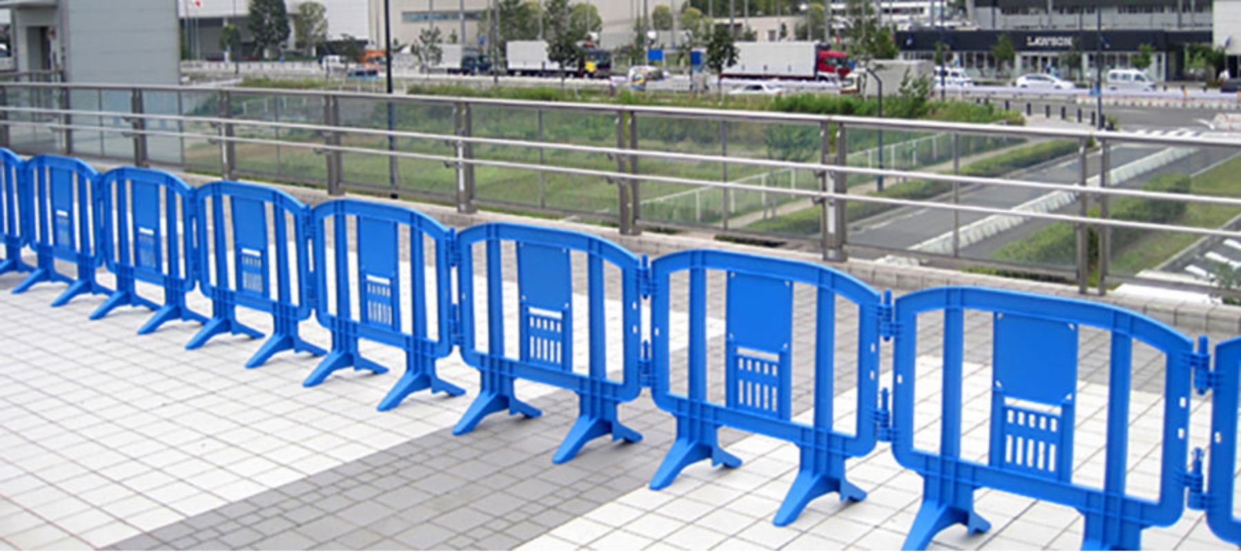 Row of interlocking blue Minit barricades